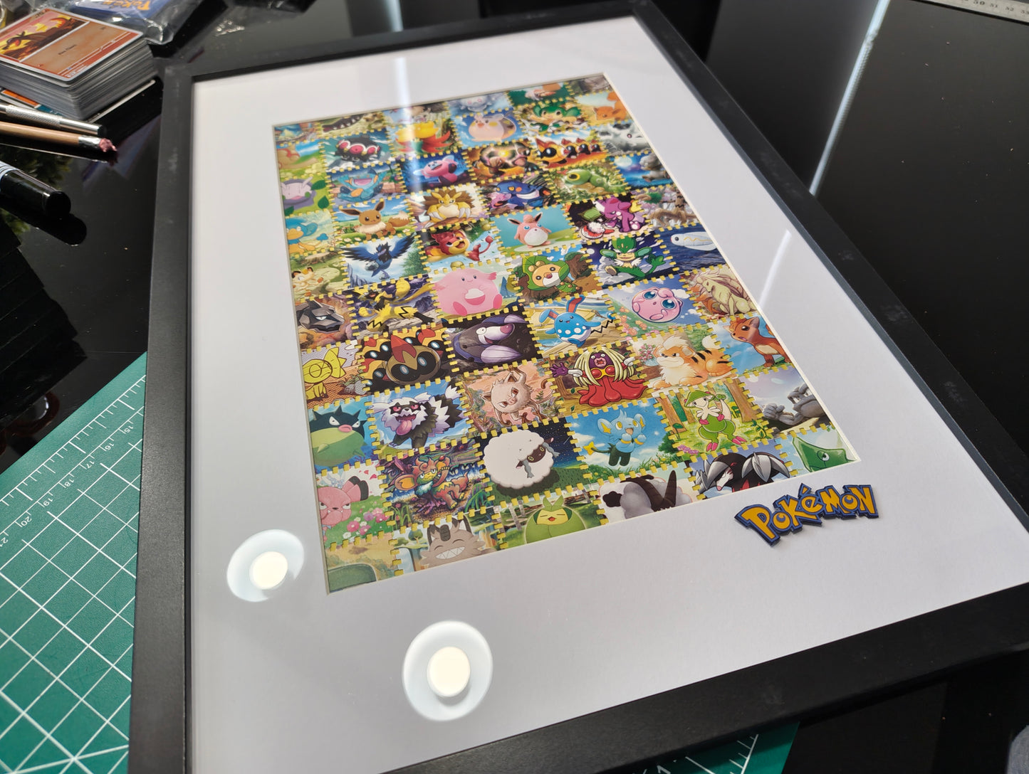 Pokémon illustration framed art featuring real cards